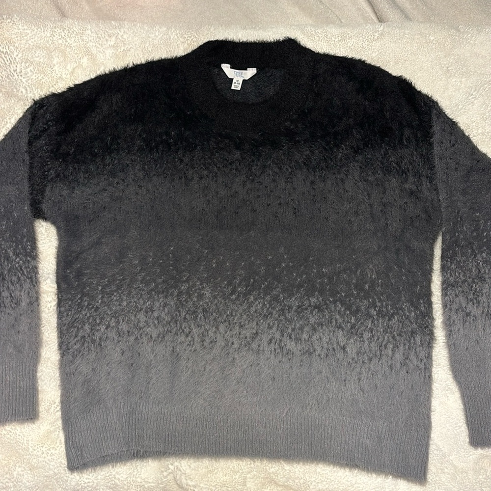 Black and gray sweater. Never worn.